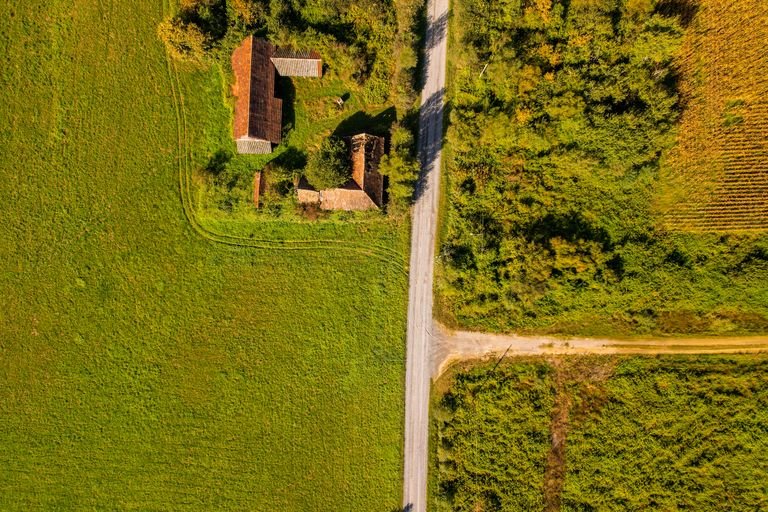 Aerial view of agricultural land parcels showing property boundaries for boundary survey article